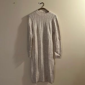Super cute long sweater dress. This is adorable with long or chunky boots!